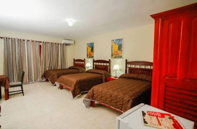 Hotel Cortecito Inn Punta Cana room 3 beds
